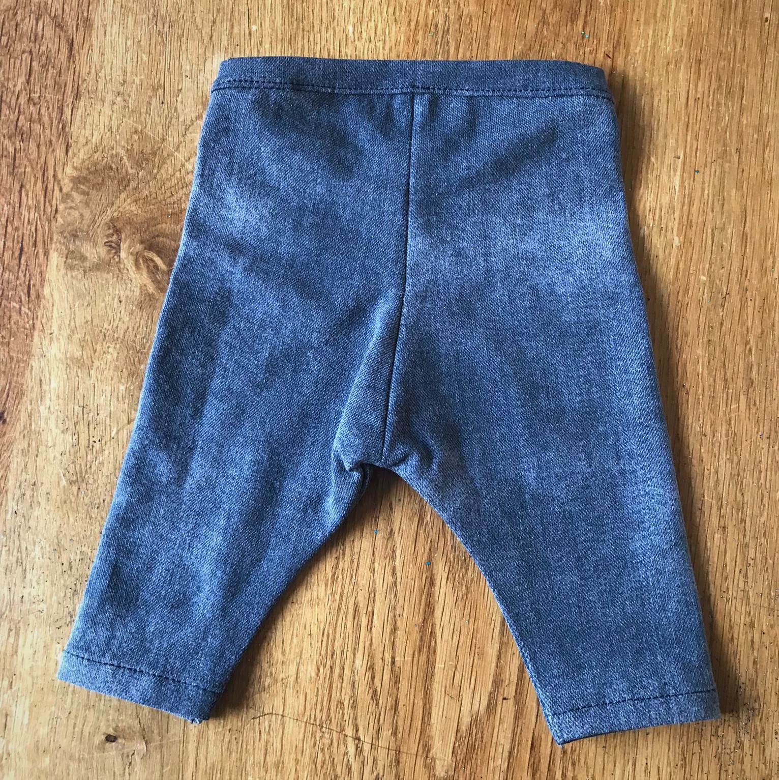 Prematuur legging donkerblauw jeans achterkant